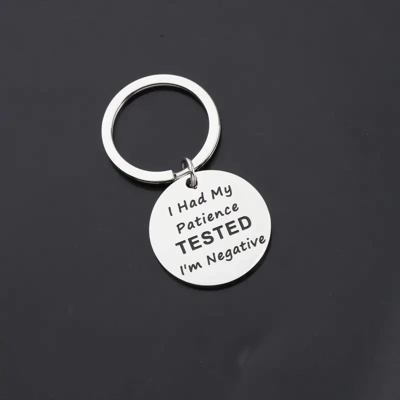 Porte-clé en acier inoxydable "I had my patience tested, I'm negative